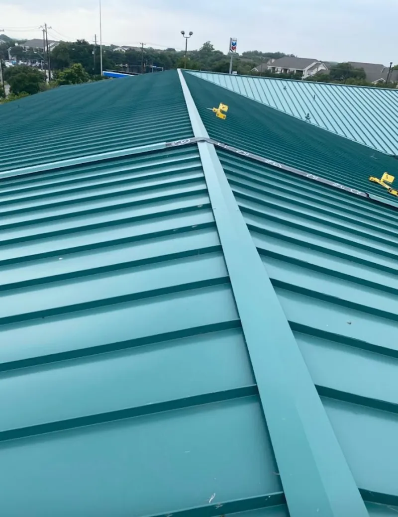 Green commercial metal roof ridge and valley for Metal Roof Repair in Corinth